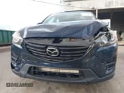 ✅ 2016 Mazda CX-5 Sport • VIN: JM3KE4BY1G0751369 • Lot: 43579410. Listed on IAAI with 163,000 mi. Free auction sales archive from the USA and detailed vehicle history report at DreamBid. Image 6.