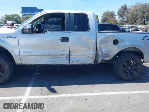 ✅ 2014 Ford F-150 XL • VIN: 1FTFX1ET4EFA77215 • Lot: 42698097. Listed on IAAI with 173,280 mi. Free auction sales archive from the USA and detailed vehicle history report at DreamBid. Image 6.