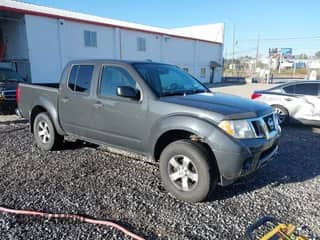 2012 Nissan Frontier SL z VIN 1N6AD0EV4CC430241, wystawiony jako IAAI lot #43408515 z przebiegiem 148 428 mil mil oraz . Historia ofert i sprzedaży dostępna na DreamBid. Obrazek 1.