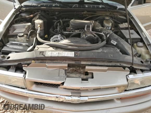 2003 Chevrolet Blazer LS z VIN 1GNDT13X73K112544, wystawiony jako Copart lot #83819714 z przebiegiem 96 738 mil mil oraz Szkoda całkowita • Salvage title. Historia ofert i sprzedaży dostępna na DreamBid. Obrazek 11.