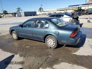 ✅ 1998 Nissan Maxima GXE • VIN: JN1CA21D0WT607873 • Lot: 80856484. Listed on Copart with 198,057 mi. Free auction sales archive from the USA and detailed vehicle history report at DreamBid. Image 2.