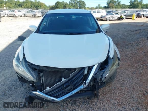 ✅ 2016 Nissan Altima SV • VIN: 1N4AL3AP8GC239657 • Lot: 43123480. Listed on IAAI with 207,773 mi. Free auction sales archive from the USA and detailed vehicle history report at DreamBid. Image 12.