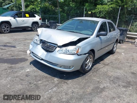 ✅ 2005 Toyota Corolla CE • VIN: JTDBR32E250055971 • Lot: 42660536. Listed on IAAI with 299,999 mi. Free auction sales archive from the USA and detailed vehicle history report at DreamBid. Image 2.