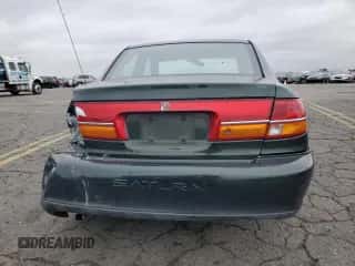 2001 Saturn LS z VIN 1G8JU54F41Y581083, wystawiony jako Copart lot #73123714 z przebiegiem 98 500 mil mil oraz Szkoda całkowita • Salvage title. Historia ofert i sprzedaży dostępna na DreamBid. Obrazek 6.