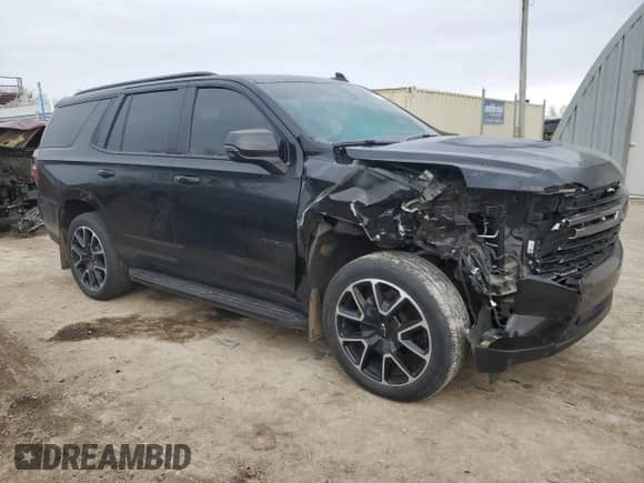 2022 Chevrolet Tahoe RST with VIN 1GNSKRKD7NR282297, listed as a Copart auction lot 41962345 with 60,720 mi miles and Salvage title. Bid and sale history available at DreamBid. Image 4.