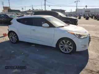 2015 Hyundai Veloster с VIN KMHTC6AD5FU225164, выставлен на аукционе Copart как лот 84994875 с пробегом 185 494 миль миль и Списание • Salvage title. История ставок и продаж доступна на DreamBid. Изображение 4.