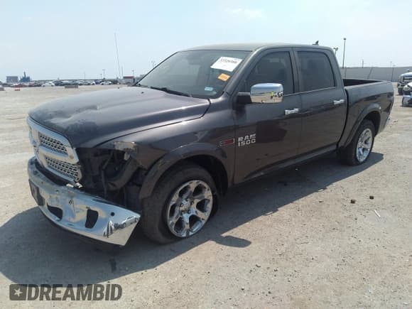 ✅ 2015 Ram 1500 Laramie • VIN: 1C6RR6NM0FS590636 • Lot: 37320388. Wystawiony na IAAI z przebiegiem 93 163 mil. Bezpłatny archiwum sprzedaży aukcyjnych z USA i szczegółowy raport historii pojazdu na DreamBid. Zdjęcie 2.