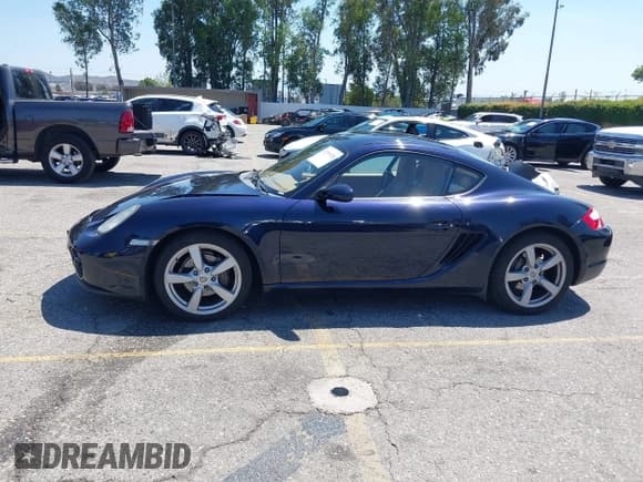 ✅ 2007 Porsche Cayman • VIN: WP0AA29837U762585 • Lot: 42201028. Listed on IAAI with 58,563 mi. Free auction sales archive from the USA and detailed vehicle history report at DreamBid. Image 14.