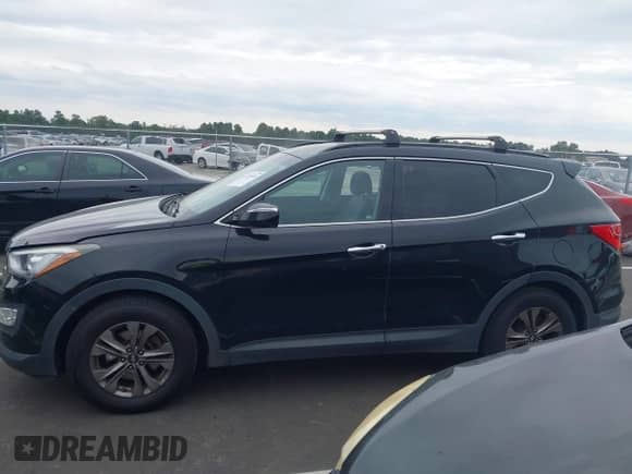 2016 Hyundai Santa Fe z VIN 5XYZUDLB4GG372753, wystawiony jako IAAI lot #43239818 z przebiegiem 134 901 mil mil oraz . Historia ofert i sprzedaży dostępna na DreamBid. Obrazek 14.