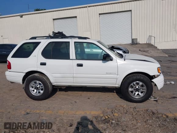 ✅ 2002 Isuzu Rodeo S • VIN: 4S2CK58W524321108 • Lot: 42352330. Listed on IAAI with 270,614 mi. Free auction sales archive from the USA and detailed vehicle history report at DreamBid. Image 14.