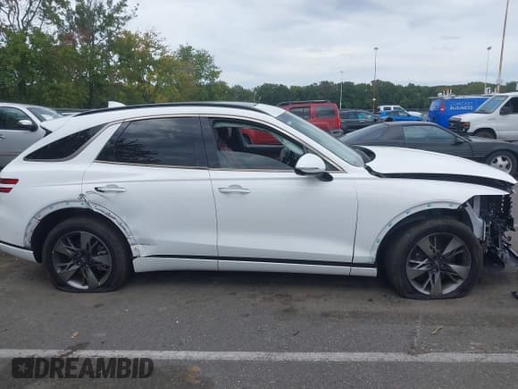 ✅ 2022 Genesis GV70 Sport • VIN: KMUMCDTCXNU029282 • Lot: 43235962. Wystawiony na IAAI z przebiegiem 30 937 mil. Bezpłatny archiwum sprzedaży aukcyjnych z USA i szczegółowy raport historii pojazdu na DreamBid. Zdjęcie 13.