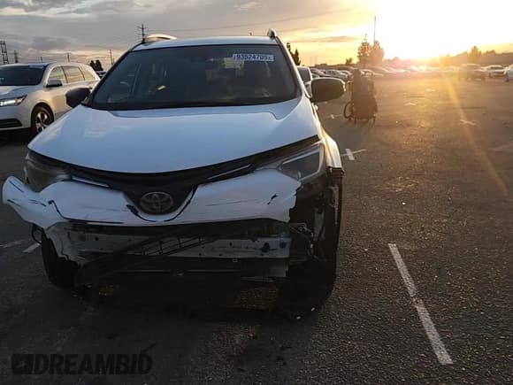 ✅ 2018 Toyota RAV4 LE • VIN: 2T3ZFREV4JW456238 • Lot: 93524705. Listed on Copart with 170,907 mi. Free auction sales archive from the USA and detailed vehicle history report at DreamBid. Image 13.