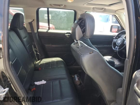 ✅ 2015 Jeep Patriot Latitude • VIN: 1C4NJPFA5FD107297 • Lot: 55774155. Listed on Copart with 144,240 mi. Free auction sales archive from the USA and detailed vehicle history report at DreamBid. Image 10.
