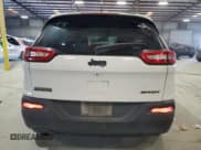 ✅ 2016 Jeep Cherokee Sport • VIN: 1C4PJLAB8GW274177 • Lot: 91631385. Listed on Copart with 243,464 mi. Free auction sales archive from the USA and detailed vehicle history report at DreamBid. Image 6.