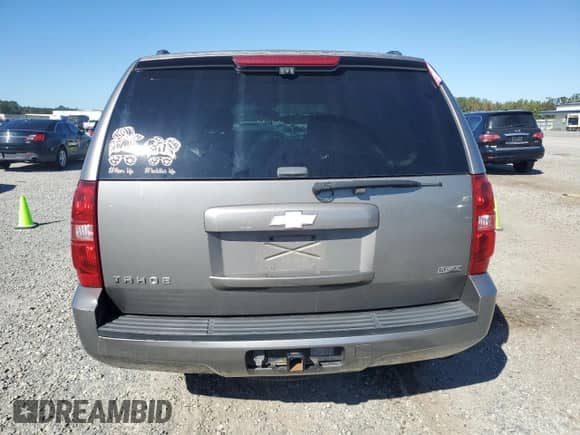 2008 Chevrolet Tahoe LTZ с VIN 1GNFC13018J194599, выставлен на аукционе Copart как лот 87207335 с пробегом 254 975 миль миль и Списание • Salvage title. История ставок и продаж доступна на DreamBid. Изображение 6.