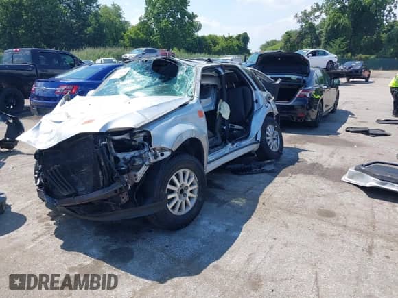 2010 Mercury Mariner Premier с VIN 4M2CN9HG3AKJ27247, выставлен на аукционе IAAI как лот 43011250 с пробегом 96 157 миль миль и . История ставок и продаж доступна на DreamBid. Изображение 2.