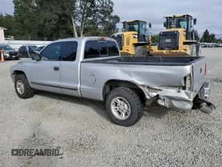 1997 Dodge Dakota z VIN 1B7GL23YXVS209874, wystawiony jako Copart lot #72293644 z przebiegiem 112 573 mil mil oraz Szkoda całkowita • Salvage title. Historia ofert i sprzedaży dostępna na DreamBid. Obrazek 2.