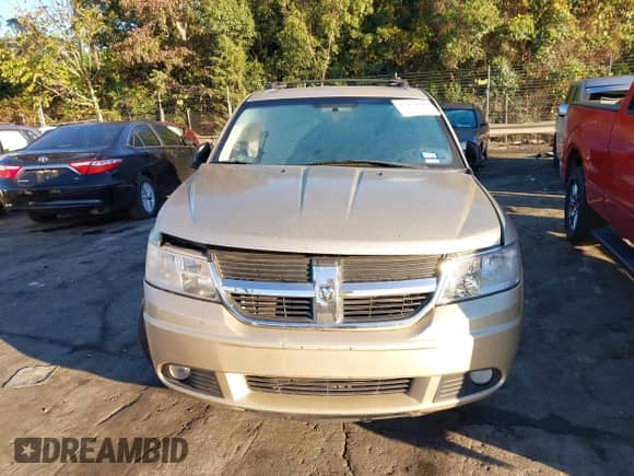 2010 Dodge Journey SE z VIN 3D4PG4FB1AT257539, wystawiony jako IAAI lot #43454199 z przebiegiem Nie podano mil oraz . Historia ofert i sprzedaży dostępna na DreamBid. Obrazek 11.