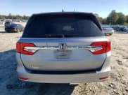 ✅ 2019 Honda Odyssey EX-L • VIN: 5FNRL6H71KB097104 • Лот: 90592755. Опубликован ранее на Copart с пробегом 105 788 миль. Бесплатный доступ к архиву аукционных продаж из США и подробный отчёт об истории автомобиля на DreamBid. Изображение 6.