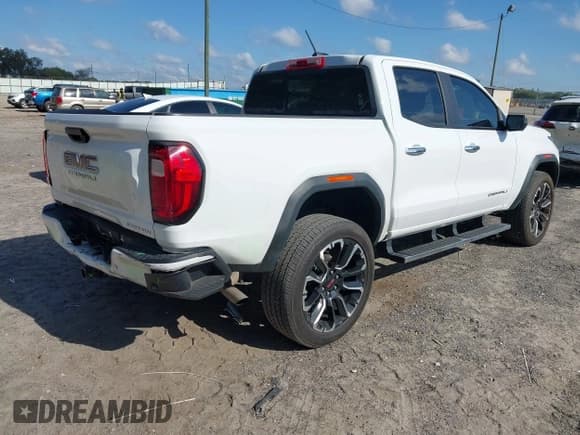 ✅ 2023 GMC Canyon 4WD Denali • VIN: 1GTP6FEK5P1218157 • Lot: 43363037. Listed on IAAI with 33,434 mi. Free auction sales archive from the USA and detailed vehicle history report at DreamBid. Image 4.