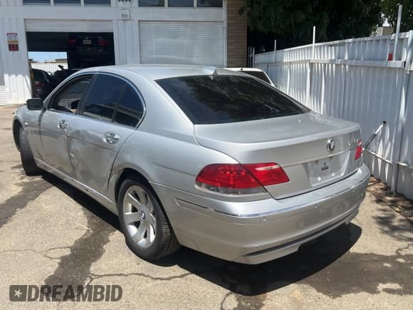 ✅ 2006 BMW 7 Series 750i • VIN: WBAHL83586DT05258 • Лот: 63863055. Опубликован ранее на Copart с пробегом 129 393 миль. Бесплатный доступ к архиву аукционных продаж из США и подробный отчёт об истории автомобиля на DreamBid. Изображение 3.