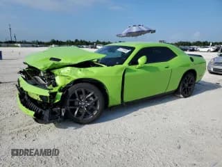 ✅ 2023 Dodge Challenger SXT • VIN: 2C3CDZAG9PH571143 • Lot: 67276504. Wystawiony na Copart z przebiegiem 14 086 mil. Bezpłatny archiwum sprzedaży aukcyjnych z USA i szczegółowy raport historii pojazdu na DreamBid. Zdjęcie 1.