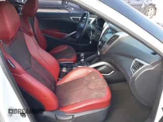 2012 Hyundai Veloster w/Black Int with VIN KMHTC6AD0CU023702, listed as a IAAI auction lot 43149525 with 166,308 mi miles and . Bid and sale history available at DreamBid. Image 5.