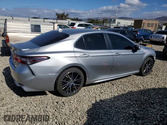 2021 Toyota Camry Hybrid SE с VIN 4T1G31AK5MU563311, выставлен на аукционе Copart как лот 84598085 с пробегом 85 740 миль миль и Списание • Salvage title. История ставок и продаж доступна на DreamBid. Изображение 3.