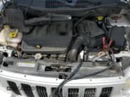 ✅ 2008 Jeep Compass Sport • VIN: 1J8FT47W18D735151 • Lot: 80169025. Listed on Copart with 214,904 mi. Free auction sales archive from the USA and detailed vehicle history report at DreamBid. Image 12.