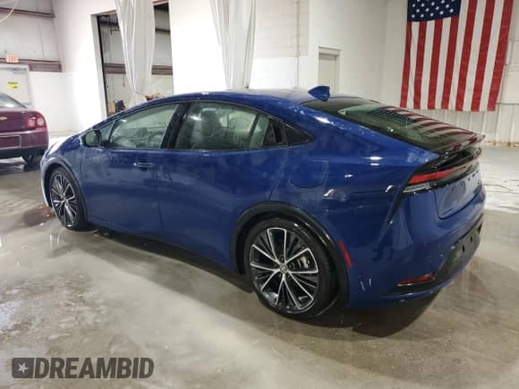 2024 Toyota Prius Limited with VIN JTDADABU3R3023573, listed as a Copart auction lot 80960385 with 5,801 mi miles and Salvage title. Bid and sale history available at DreamBid. Image 2.