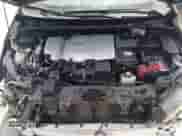 2021 Toyota Prius LE z VIN JTDKAMFP7M3176372, wystawiony jako Copart lot #68893794 z przebiegiem 59 421 mil mil oraz Szkoda całkowita • Salvage title. Historia ofert i sprzedaży dostępna na DreamBid. Obrazek 11.