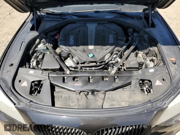 ✅ 2013 BMW 7 Series 750i • VIN: WBAYA8C59DD227527 • Lot: 64618025. Listed on Copart with 96,049 mi. Free auction sales archive from the USA and detailed vehicle history report at DreamBid. Image 11.