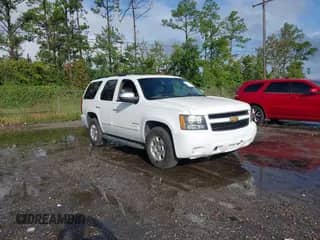 2014 Chevrolet Tahoe LT z VIN 1GNSCBE0XER199816, wystawiony jako IAAI lot #43352185 z przebiegiem 179 889 mil mil oraz . Historia ofert i sprzedaży dostępna na DreamBid. Obrazek 1.