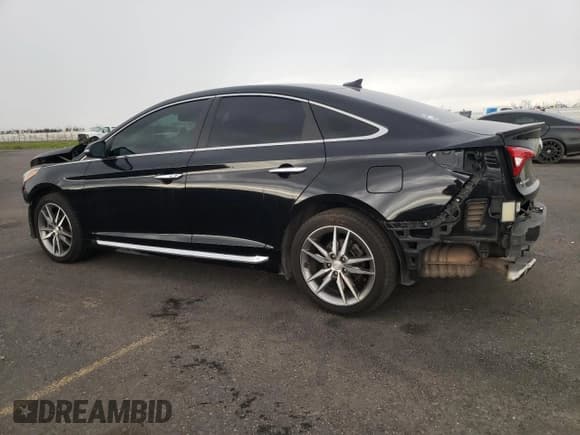 ✅ 2015 Hyundai Sonata Sport • VIN: 5NPE34AB6FH194615 • Lot: 36768773. Listed on Copart with 103,094 mi. Free auction sales archive from the USA and detailed vehicle history report at DreamBid. Image 2.