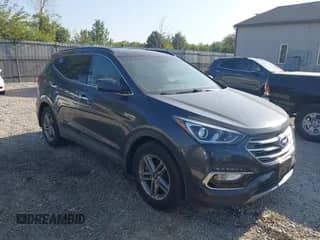 2017 Hyundai Santa Fe 2.4L z VIN 5XYZU3LB9HG460483, wystawiony jako IAAI lot #43207231 z przebiegiem 109 465 mil mil oraz . Historia ofert i sprzedaży dostępna na DreamBid. Obrazek 1.