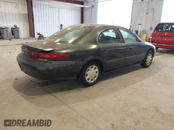 ✅ 1998 Mercury Sable GS • VIN: 1MEFM50U2WA614242 • Lot: 43900170. Listed on IAAI with 76,790 mi. Free auction sales archive from the USA and detailed vehicle history report at DreamBid. Image 4.