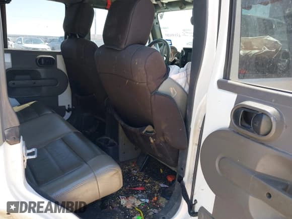 ✅ 2010 Jeep Wrangler Unlimited Sahara • VIN: 1J4HA5H19AL215395 • Лот: 43199080. Опубликован ранее на IAAI с пробегом 206 729 миль. Бесплатный доступ к архиву аукционных продаж из США и подробный отчёт об истории автомобиля на DreamBid. Изображение 8.