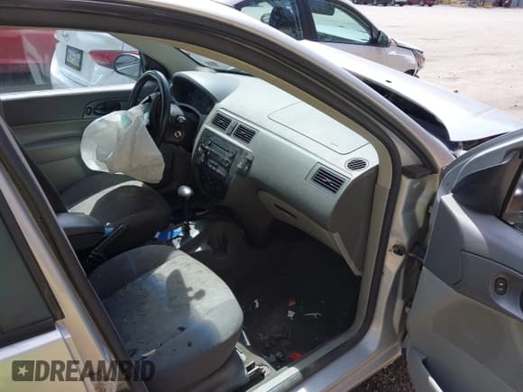 ✅ 2005 Ford Focus S • VIN: 1FAFP34N65W311598 • Lot: 42098635. Listed on IAAI with 123,738 mi. Free auction sales archive from the USA and detailed vehicle history report at DreamBid. Image 5.