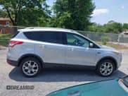 ✅ 2015 Ford Escape Titanium • VIN: 1FMCU0J90FUB24894 • Lot: 42468012. Listed on IAAI with 245,683 mi. Free auction sales archive from the USA and detailed vehicle history report at DreamBid. Image 13.