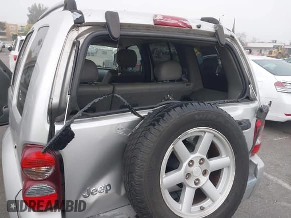 ✅ 2005 Jeep Liberty Limited • VIN: 1J4GK58KX5W704393 • Lot: 41675508. Listed on IAAI with 188,403 mi. Free auction sales archive from the USA and detailed vehicle history report at DreamBid. Image 6.