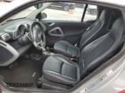 ✅ 2009 Smart fortwo Passion • VIN: WMEEK31X69K273685 • Lot: 77638984. Listed on Copart with 59,228 mi. Free auction sales archive from the USA and detailed vehicle history report at DreamBid. Image 7.