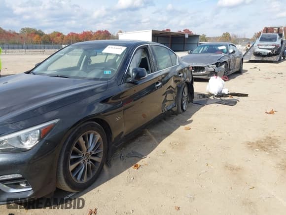 ✅ 2019 Infiniti Q50 Luxe • VIN: JN1EV7AR2KM594151 • Lot: 43644091. Listed on IAAI with 110,739 mi. Free auction sales archive from the USA and detailed vehicle history report at DreamBid. Image 14.