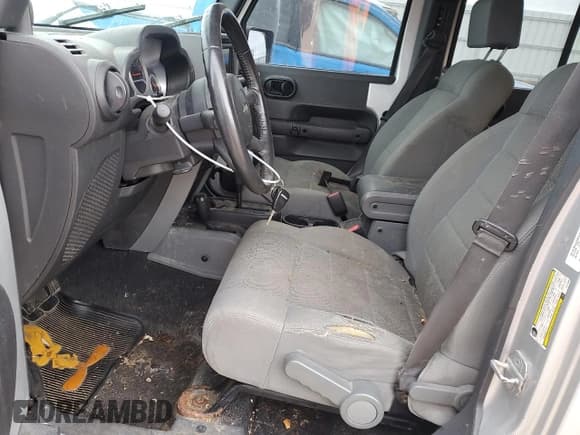 ✅ 2007 Jeep Wrangler Unlimited Sahara • VIN: 1J4GA59167L212909 • Lot: 82455775. Listed on Copart with 124,148 mi. Free auction sales archive from the USA and detailed vehicle history report at DreamBid. Image 7.