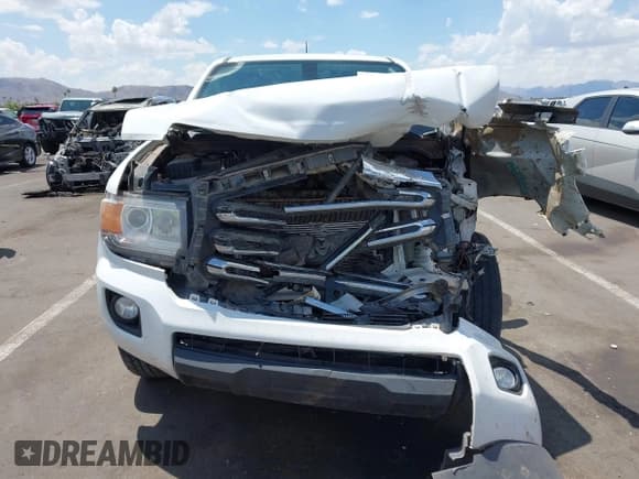 ✅ 2020 GMC Canyon 2WD SLE • VIN: 1GTG5CEN5L1223297 • Лот: 42806221. Опубликован ранее на IAAI с пробегом 120 403 миль. Бесплатный доступ к архиву аукционных продаж из США и подробный отчёт об истории автомобиля на DreamBid. Изображение 12.