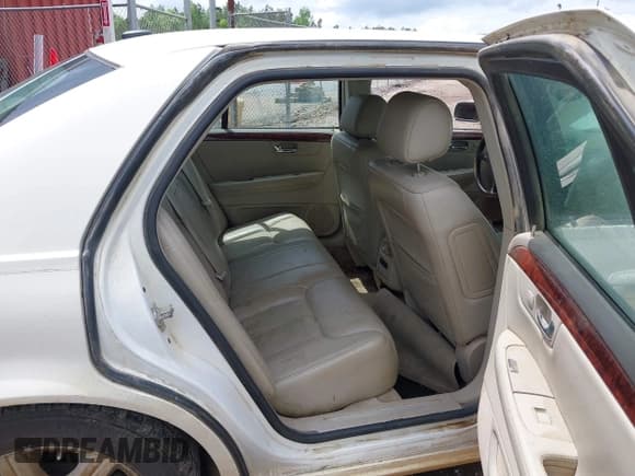 ✅ 2006 Cadillac DTS 1SB • VIN: 1G6KD57Y06U126675 • Lot: 42122625. Wystawiony na IAAI z przebiegiem 184 312 mil. Bezpłatny archiwum sprzedaży aukcyjnych z USA i szczegółowy raport historii pojazdu na DreamBid. Zdjęcie 8.