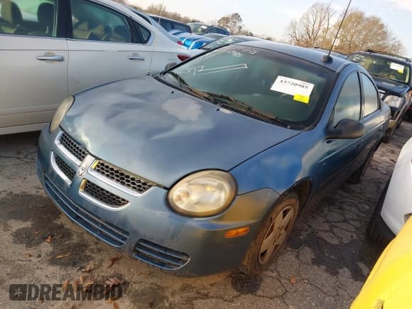 ✅ 2003 Dodge Neon SE • VIN: 1B3ES26C83D230011 • Lot: 43720985. Listed on IAAI with 263,182 mi. Free auction sales archive from the USA and detailed vehicle history report at DreamBid. Image 2.