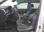 2020 Chevrolet Tahoe Premier with VIN 1GNSKCKJXLR182971, listed as a Copart auction lot 87268634 with 210,000 mi miles and Salvage title. Bid and sale history available at DreamBid. Image 7.