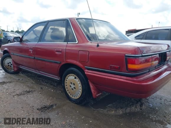 ✅ 1990 Toyota Camry • VIN: 4T1SV22E4LU267956 • Lot: 42514219. Wystawiony na IAAI z przebiegiem 247 355 mil. Bezpłatny archiwum sprzedaży aukcyjnych z USA i szczegółowy raport historii pojazdu na DreamBid. Zdjęcie 3.