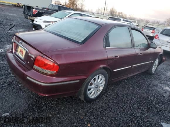 2003 Hyundai Sonata GLS с VIN KMHWF35H33A771104, выставлен на аукционе Copart как лот 86529444 с пробегом 29 433 миль миль и Списание • Salvage title. История ставок и продаж доступна на DreamBid. Изображение 3.
