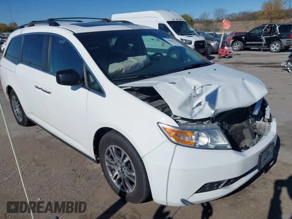 ✅ 2012 Honda Odyssey EX-L • VIN: 5FNRL5H68CB076110 • Lot: 43604213. Listed on IAAI with 208,000 mi. Free auction sales archive from the USA and detailed vehicle history report at DreamBid. Image 1.